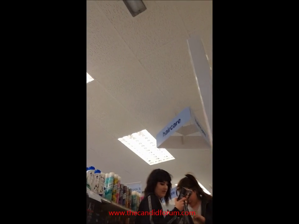 Goth teen upskirt in store